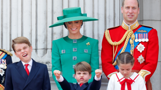 Prince George of Wales, Prince Louis of Wales, Catherine, Princess of Wales, Princess Charlotte of Wales and Prince William, Prince of Wales watch an RAF flypast from the balcony of Buckingham Palace during Trooping the Colour on June 17, 2023 in London, England