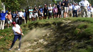 Scottie Scheffler plays a shot from a bunker during the 2017 Walker Cup at Los Angeles Country Club