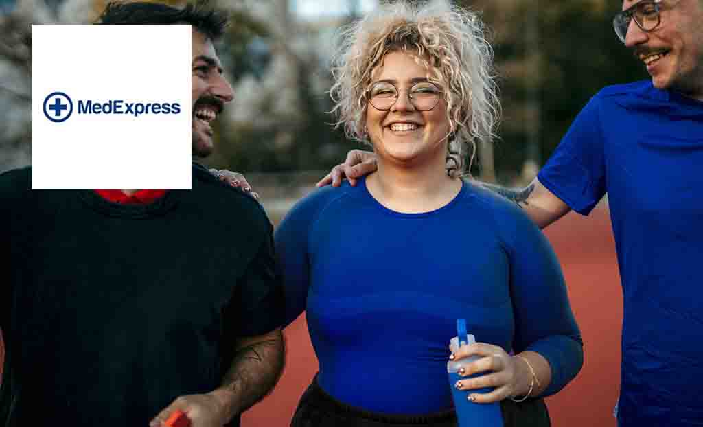 medexpress logo top left with a woman with curly hair in a blue top smiling in the middle of two men 