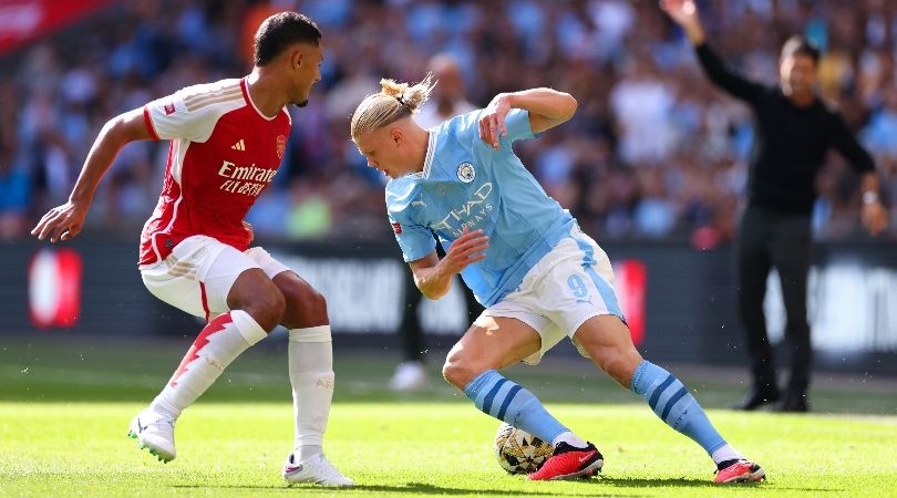 Manchester City&#039;s Erling Haaland and Arsenal&#039;s William Saliba compete for the ball in the Community Shield in August 2023.