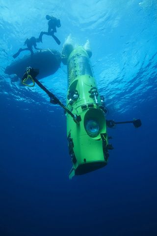 deepsea challenger submersible takes a test dive in the deep sea.