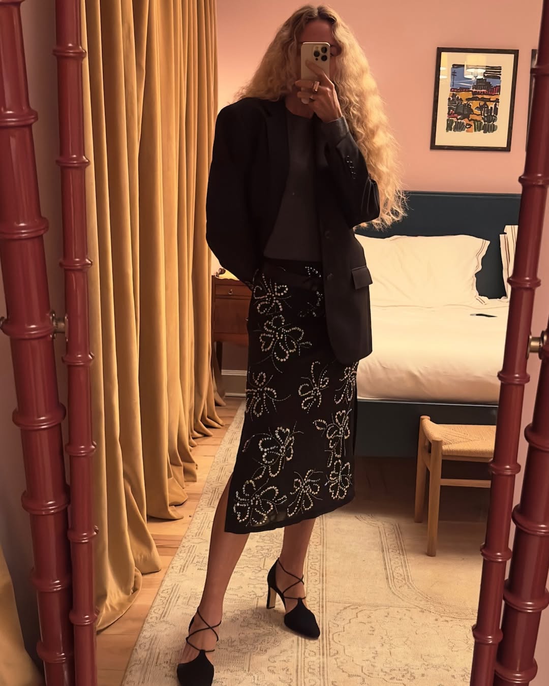 Woman wearing midi skirt and tuxedo blazer