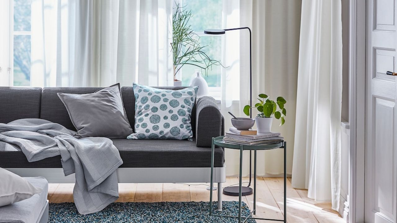 White transparent curtains hanging in living room