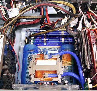 A look at the water cooling block, beneath which the Pentium D 805 is housed. To the immediate right, you'll see a passively-cooled ATI 1600 graphics card, which is adequate for non-gamers.