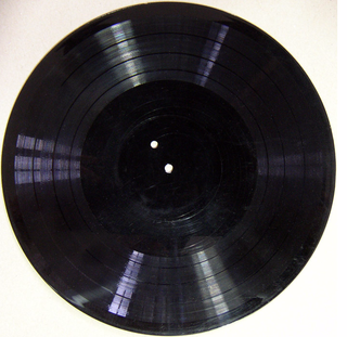 The 12-inch single-sided acetate disc captured three songs: "God Save the King," "Baa, Baa, Black Sheep" and Glenn Miller's famous swing melody "In the Mood."