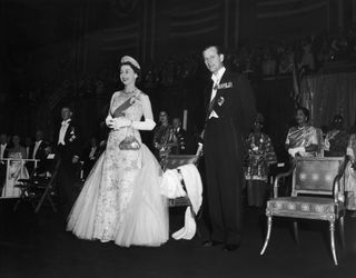 Queen Elizabeth and Prince Philip at the Commonwealth Ball at the 77th Regiment Armoury, New York