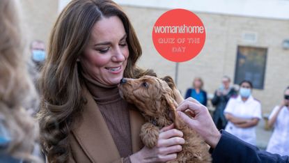 Kate Middleton holding a puppy