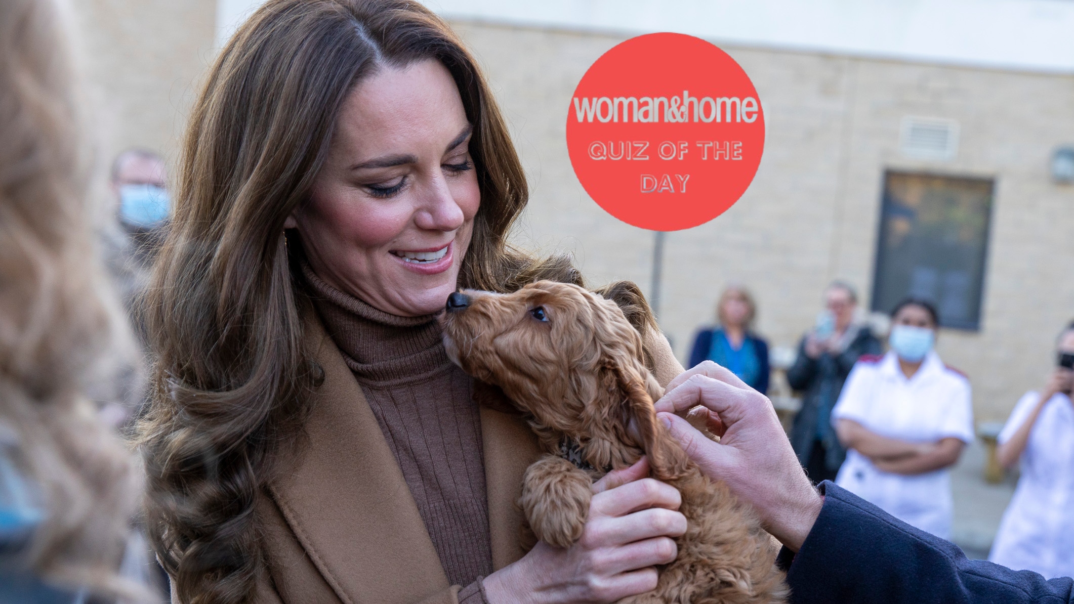 Kate Middleton holding a puppy