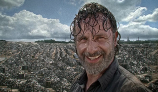 rick smiling with helicopter in background