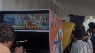 Kids playing arcade games in Jaws.