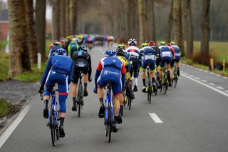 NOKERE BELGIUM MARCH 17 The peloton during the 75th Nokere Koerse Danilith Classic 2021 Mens Elite a 1955km race from Deinze to Nokere Detail view Landscape NokereKoerse on March 17 2021 in Nokere Belgium Photo by Luc ClaessenGetty Images