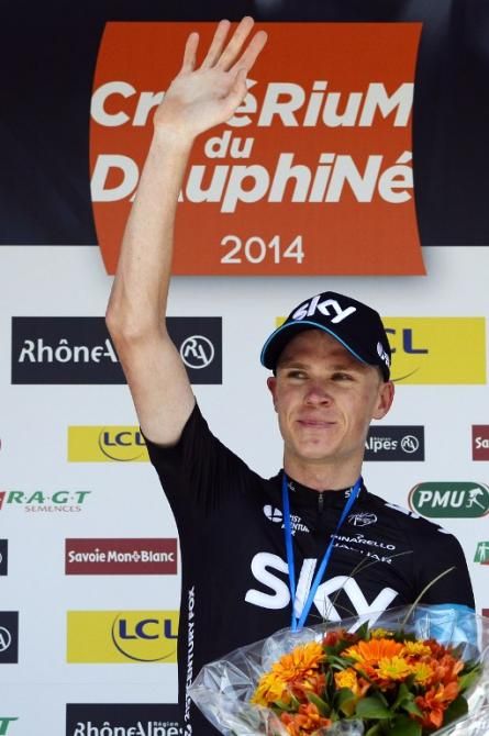 Chris Froome (Team Sky) waves to the crowd from the podium