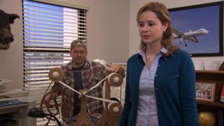 Pam confronts Dwight while Nate unplies the toilet paper