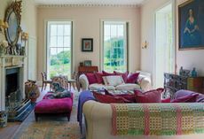 The drawing room enlivened with splashes of colour—and the family dog: a lurcher named Mouse. Credit: Stacey Bewkes / Rizzoli.