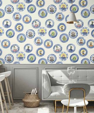 kitchen dining area with grey wall panelled effect wallpaper on lower half of wall and wallpaper above with faux plate design