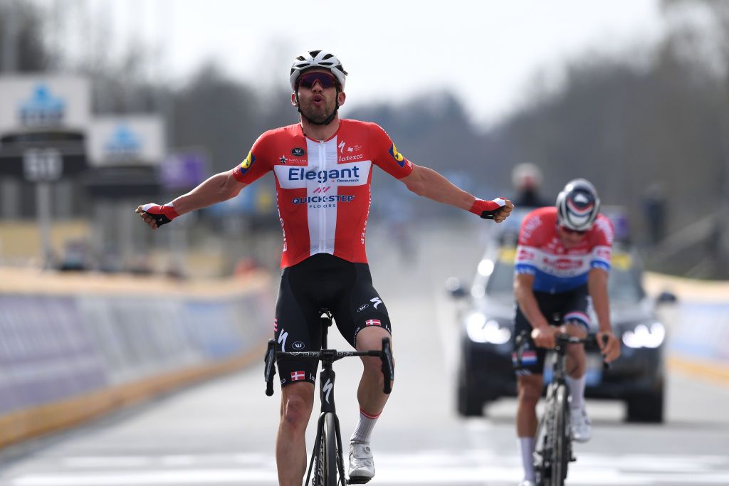 OUDENAARDE BELGIUM APRIL 04 Arrival Kasper Asgreen of Denmark and Team Deceuninck QuickStep Celebration Mathieu Van Der Poel of Netherlands and Team AlpecinFenix during the 105th Ronde van Vlaanderen Tour of Flanders 2021 Mens Elite a 2515km race from Antwerp to Oudenaarde RVV21 rondevanvlaanderen tourofflanders on April 04 2021 in Oudenaarde Belgium Photo by Tim de WaeleGetty Images