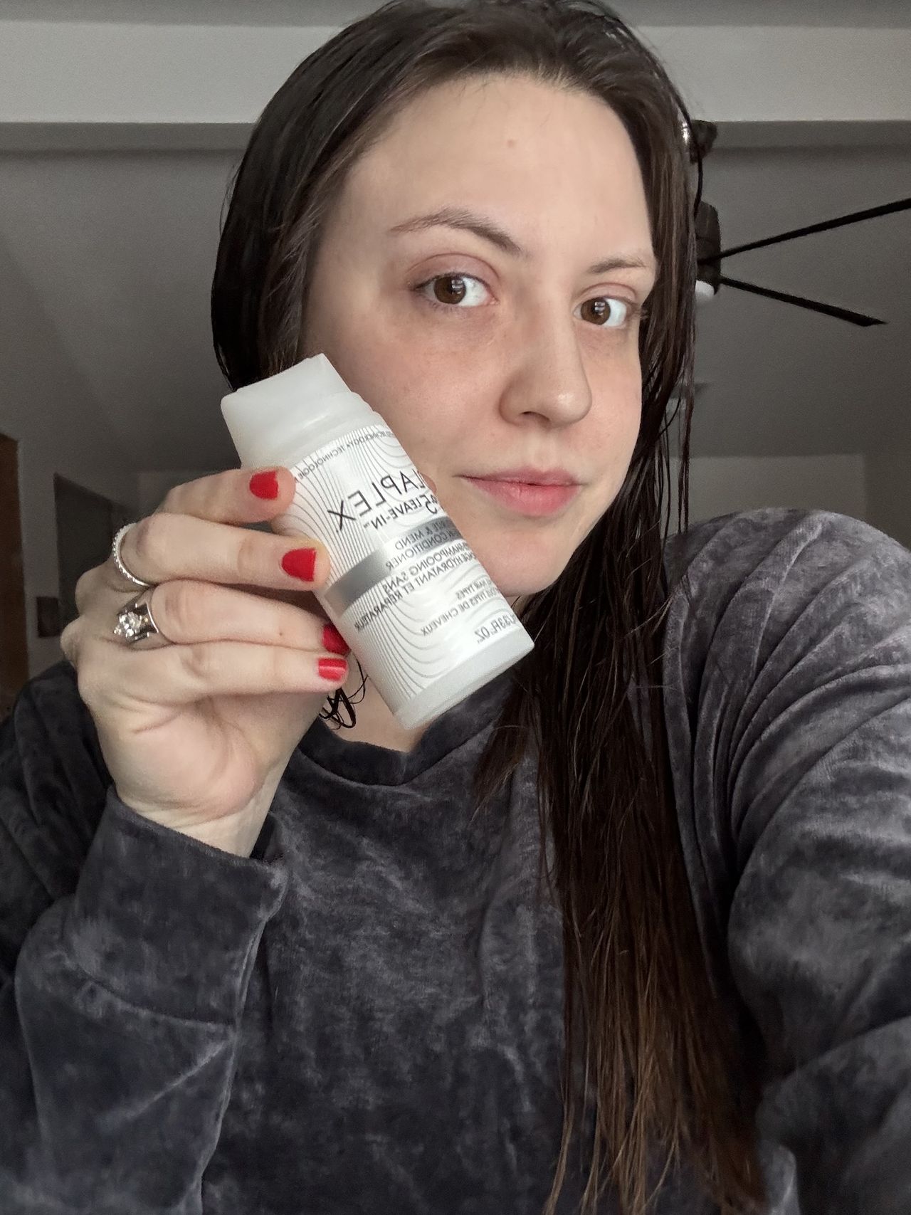 Sophia Vilensky before combing Olaplex through her hair.