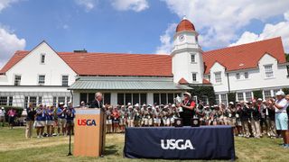 Laura Davies receives the trophy at the 2018 US Women's Senior Open