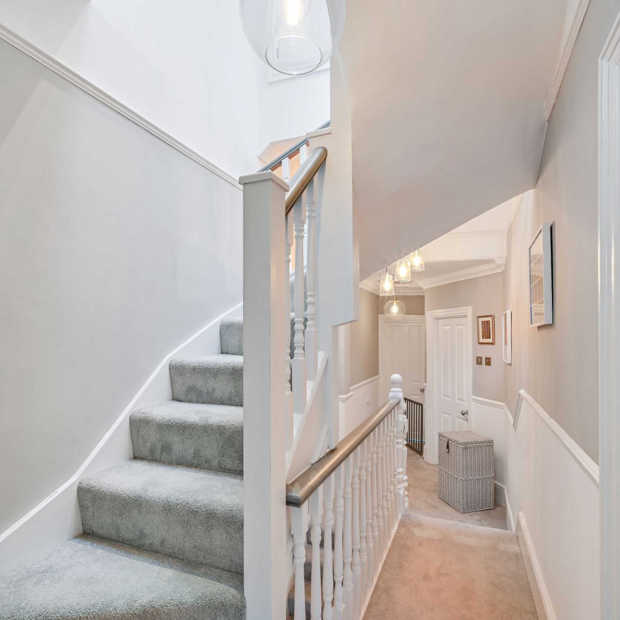 Loft conversion staircase with grey carpet