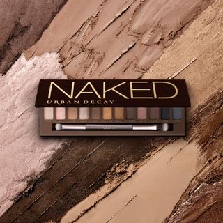 Urban Decay Original Naked Cosmetics Palette auf buntem Hintergrund