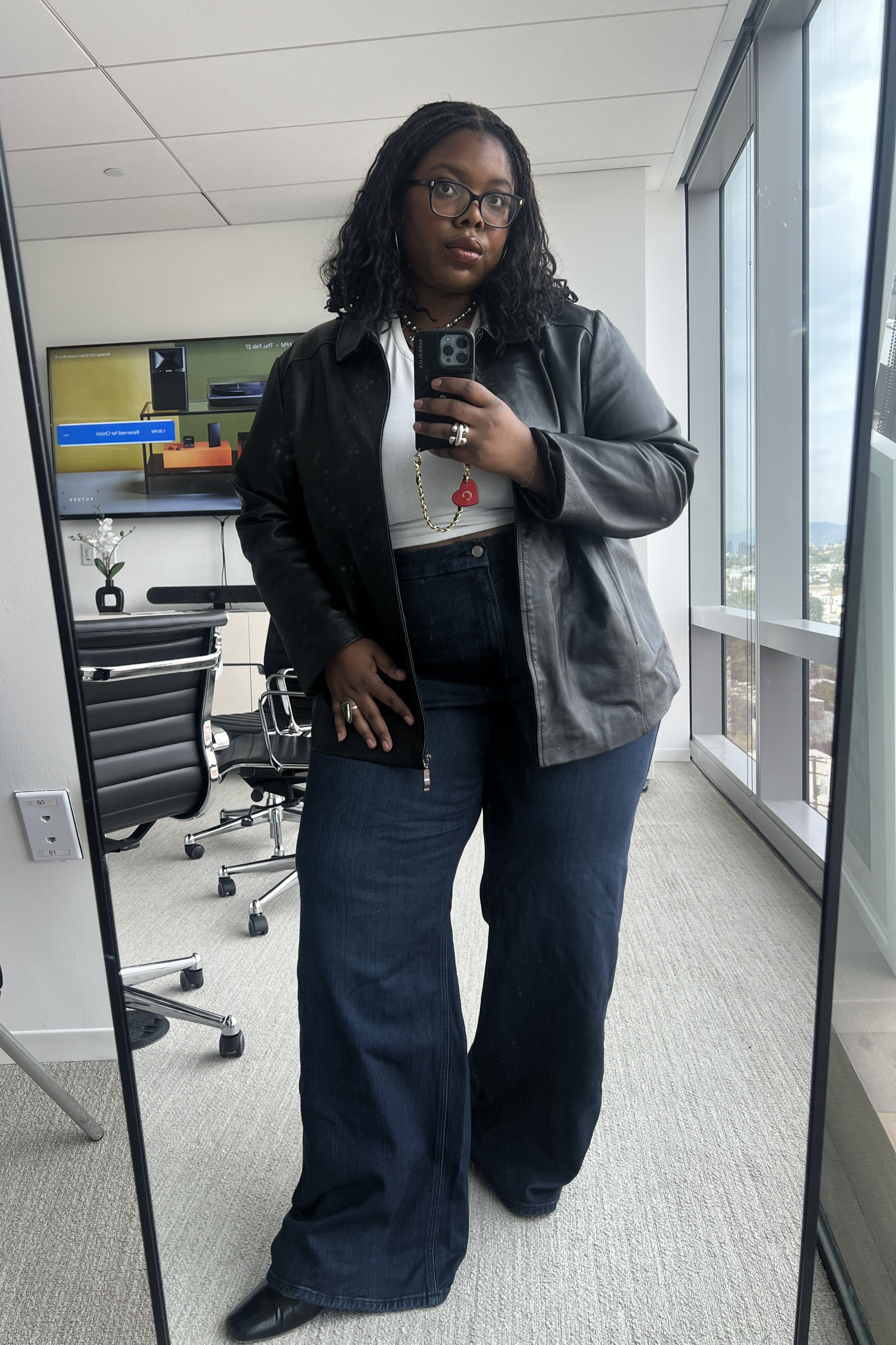 A woman wearing wide-leg jeans