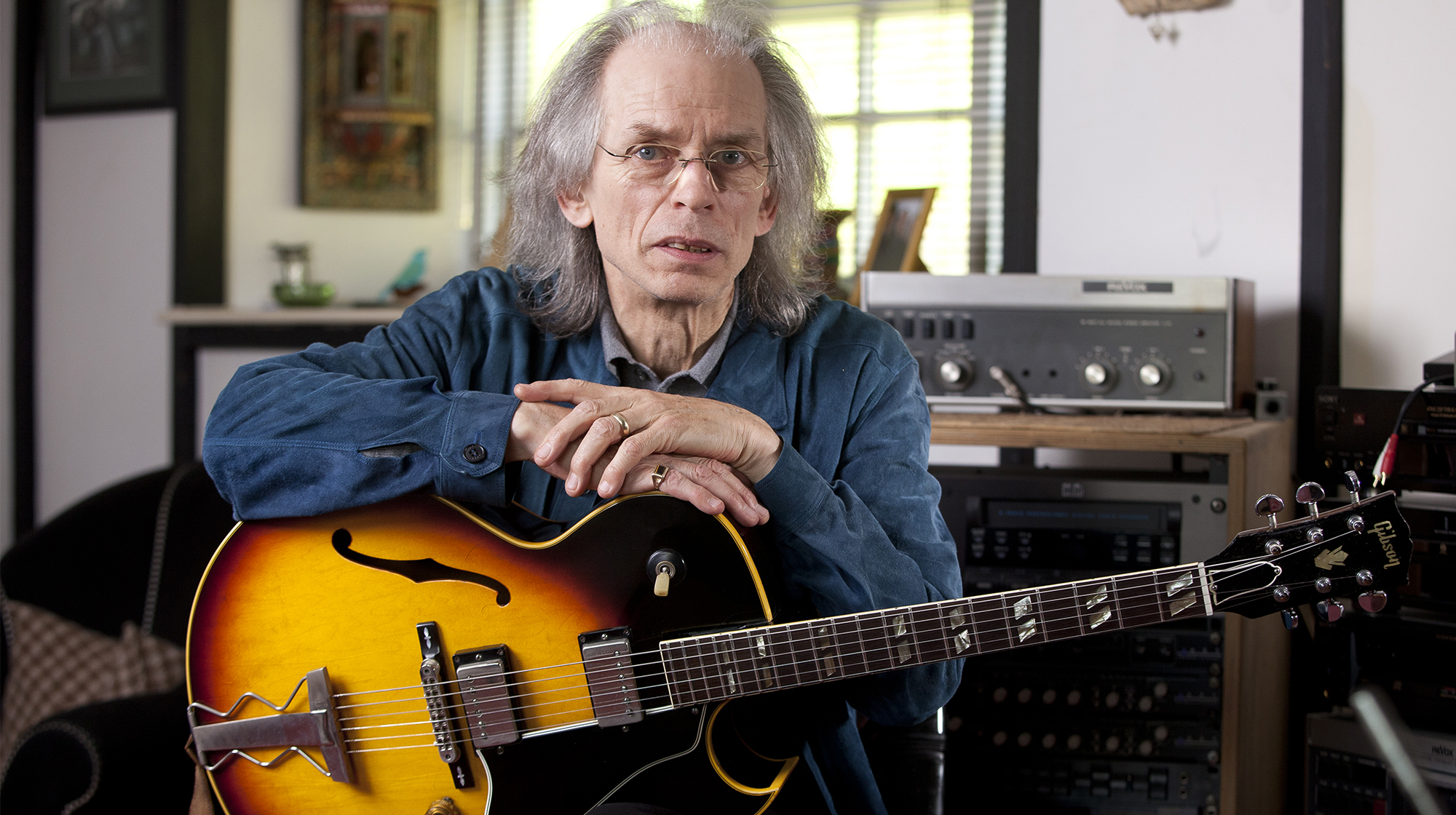 Steve Howe and his guitar collection at his home in Romanleigh, Devon. 22 May 2012