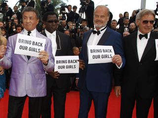 Bring Back Our Girls signs on the Cannes 2014 red carpet
