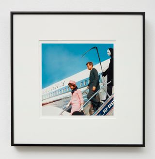 American president John F Kennedy and his wife, Jaqueline Onassis, descending from Air Force One