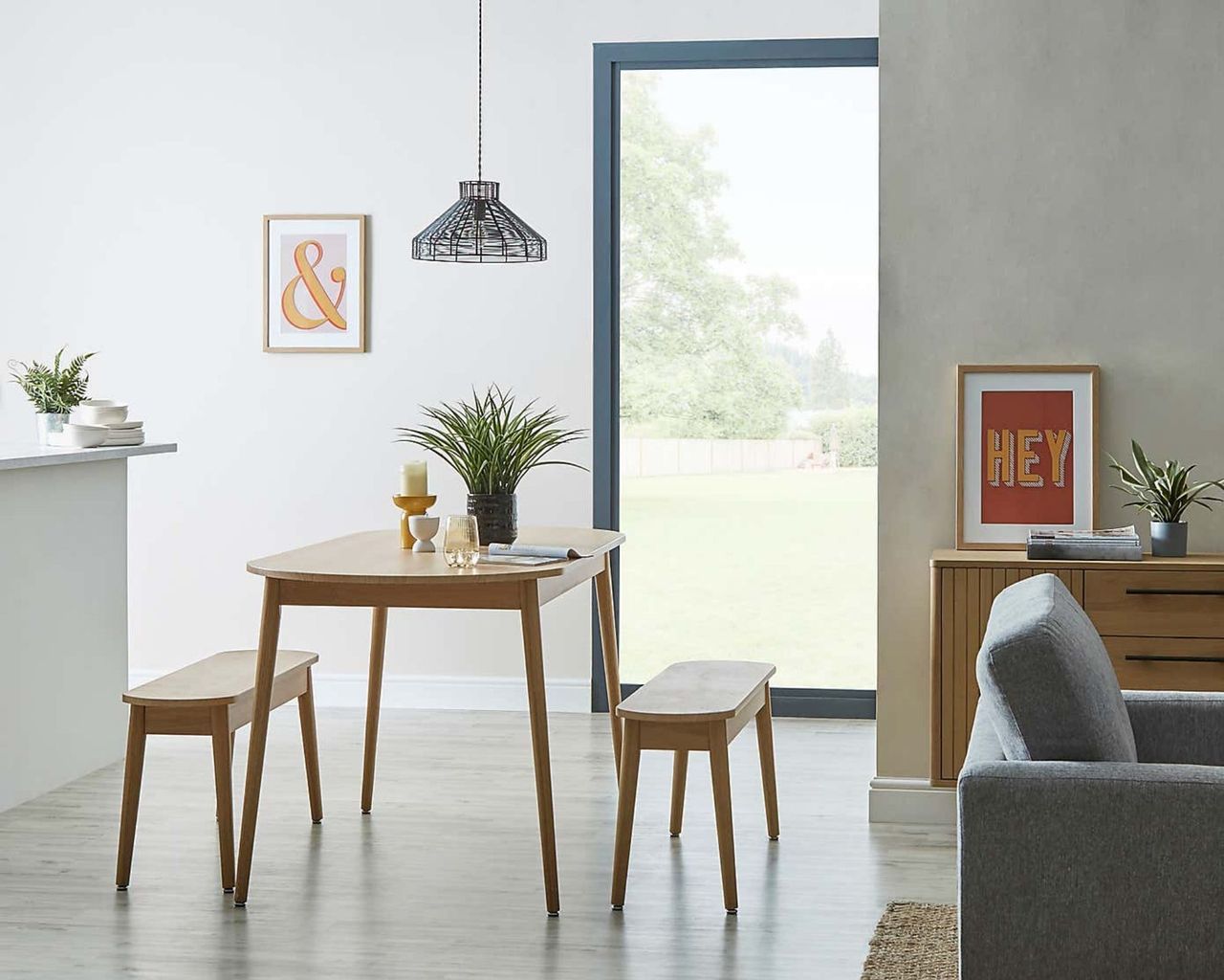 Dunelm Joseph Dining Table Oak Effect inside white home with large window and two matching benches