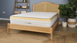 The Helix Dawn Mattress on a bed frame in our testing studio, as we prepare to test it for comfort, support and performance