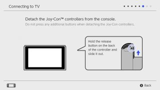 Detach the Joy-Cons from either side of the Switch