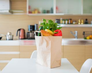 how to get rid of pests - brown paper bag veg kitchen - GettyImages-1051728916