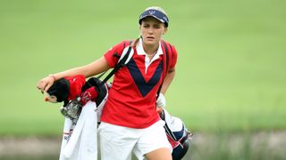 Lexi Thompson carries her own bag at the 2009 Junior Solheim Cup