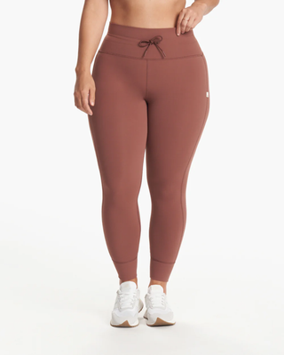 A picture of a woman wearing leggings.