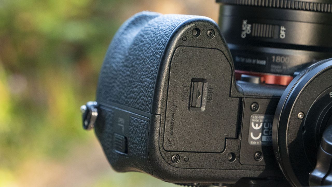 Closeup of the Sony A7R VI camera's battery door, it's closed