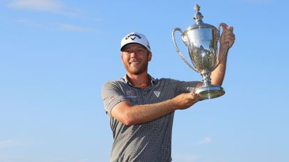 Talor Gooch poses with the trophy after winning the 2021 RSM Classic