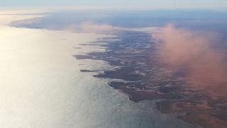 The Pilbara coast of Western Australia flying towards the Gorgon liquefied natural gas (LNG) and carbon capture and storage (CCS) facility, operated by Chevron Corp., at Barrow Island, Australia, on Monday, July 24, 2023.