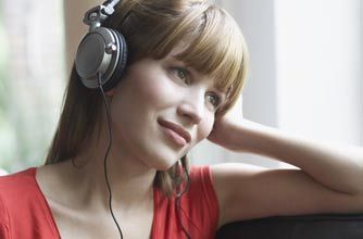 Woman listening to headphones_rex
