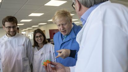 Boris Johnson at a laboratory in Bedford