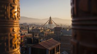 Boudhanath Stupa basking in the golden glow of the morning light.