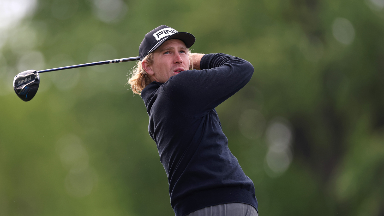 Travis Smyth hits a driver off the tee