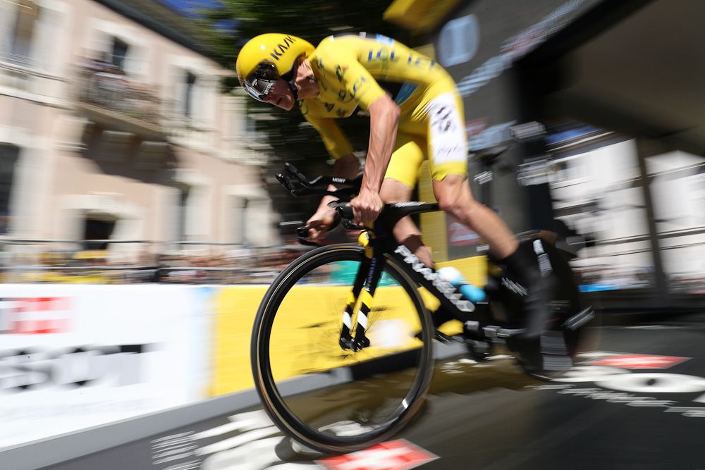 Chris Froome flies out of the start house during the stage 13 time trial.