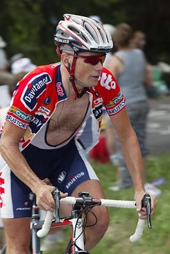 Chris Horner (Davitamon-Lotto) rides in by himself.