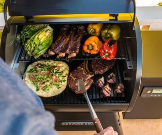 Grilling steaks, onions, flatbread, cabbage, ribs and peppers on the Traeger Ironwood 650