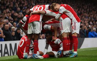 Arsenal players celebrate scoring a goal | Arsenal vs Manchester United live stream