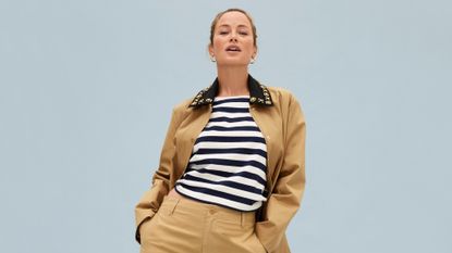 Woman wearing a Breton striped top by J. Crew