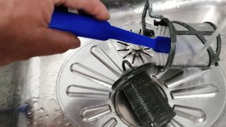 how to remove a dishwasher filter hand scrubbing dishwasher filter