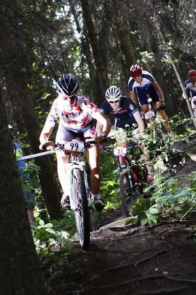Emily Batty (Trek World Racing) starting to lap the elite men's field
