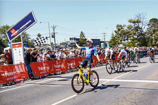 Cameron Scott (ARA Pro Racing Sunshine Coast) holds out to take a solo victory at the 2022 Melbourne to Warrnambool as the quickly closing bunch sprints for the minor placings