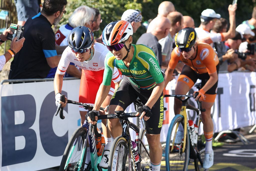 South Africas Ashleigh MoolmanPasio C Polands Katarzyna Niewiadoma L and Netherlands Marianne Vos R compete in the womens elite cycling road race 1577km from Antwerp to Leuven on the seventh day of the Flanders 2021 UCI Road World Championships on September 25 2021 Photo by Kenzo Tribouillard AFP Photo by KENZO TRIBOUILLARDAFP via Getty Images